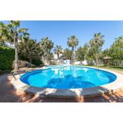 Casa en la playa con piscinas 11 A