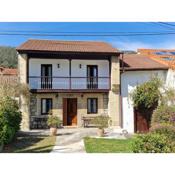 Casa rústica con jardín en Pesués
